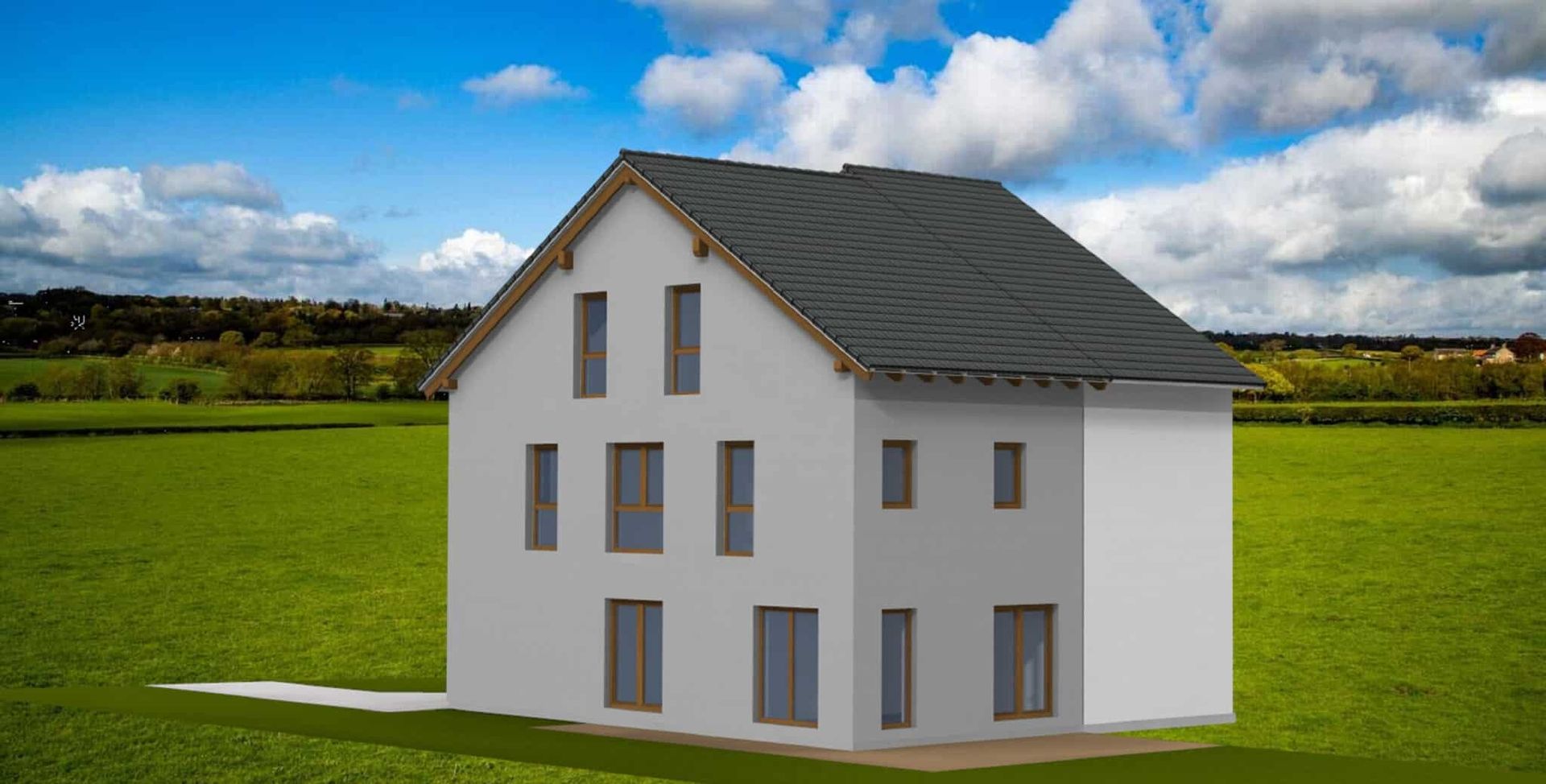 Dreigeschossiges Einfamilienhaus mit grauem Satteldach, weißen Wänden und großen Fenstern. Umgeben von einer grünen Wiese und bewölktem Himmel.